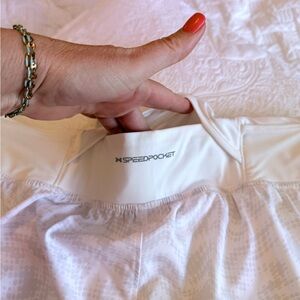 2 pair of Under Armour White and light Grey athletic shorts 3.5”